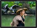 Cormorant and fisherman 2 - Huu Tri Tran